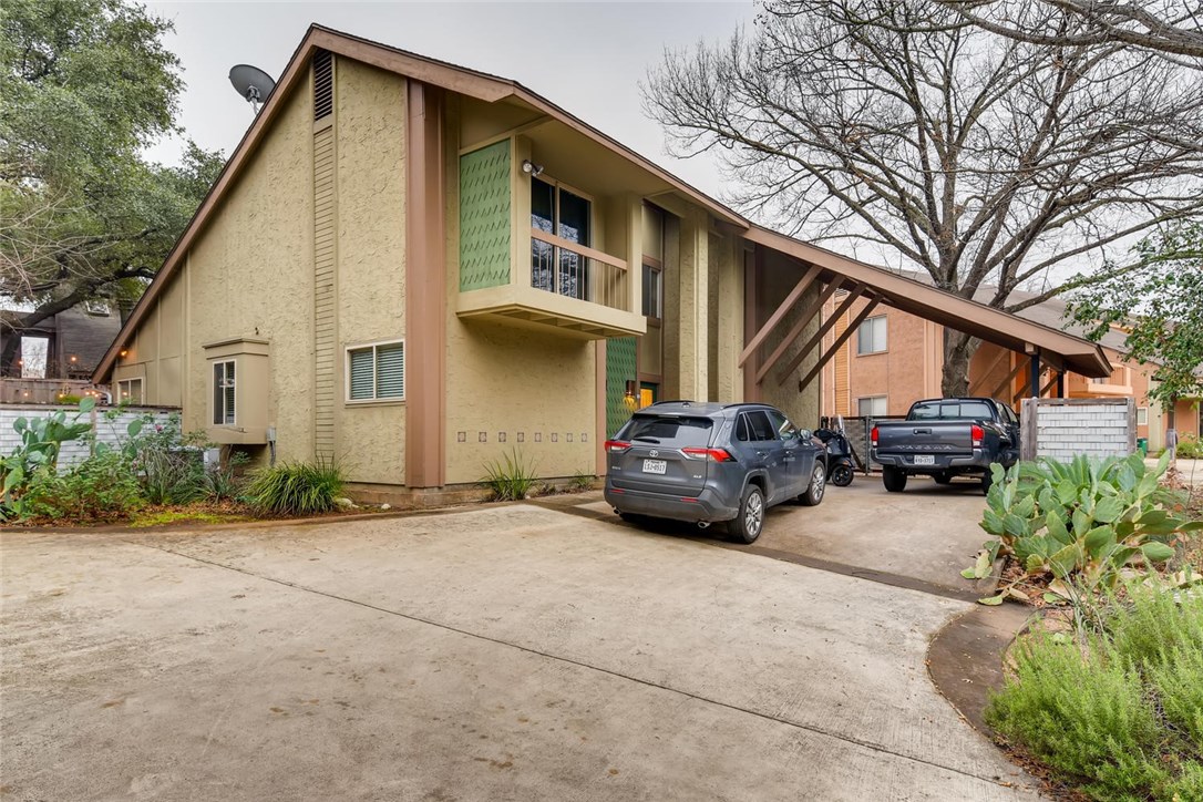 1403 Bridgeway Drive, Unit B Austin, TX 78704 - Photo 1 of 1 a view of a car park in front of house
