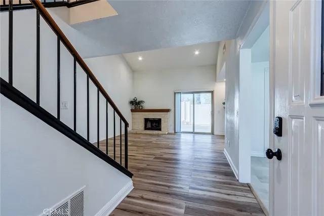 a kitchen with stainless steel appliances a stove sink and cabinets
