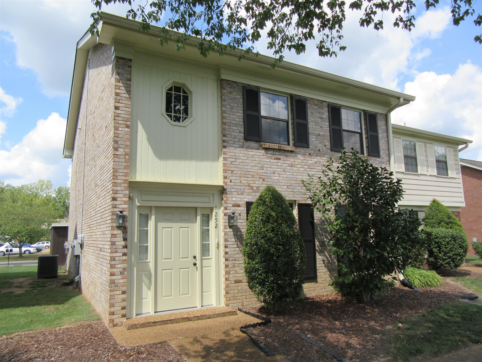 1252 General George Patton Road Nashville, TN 37221 - Photo 1 of 30 front view of a house with a yard