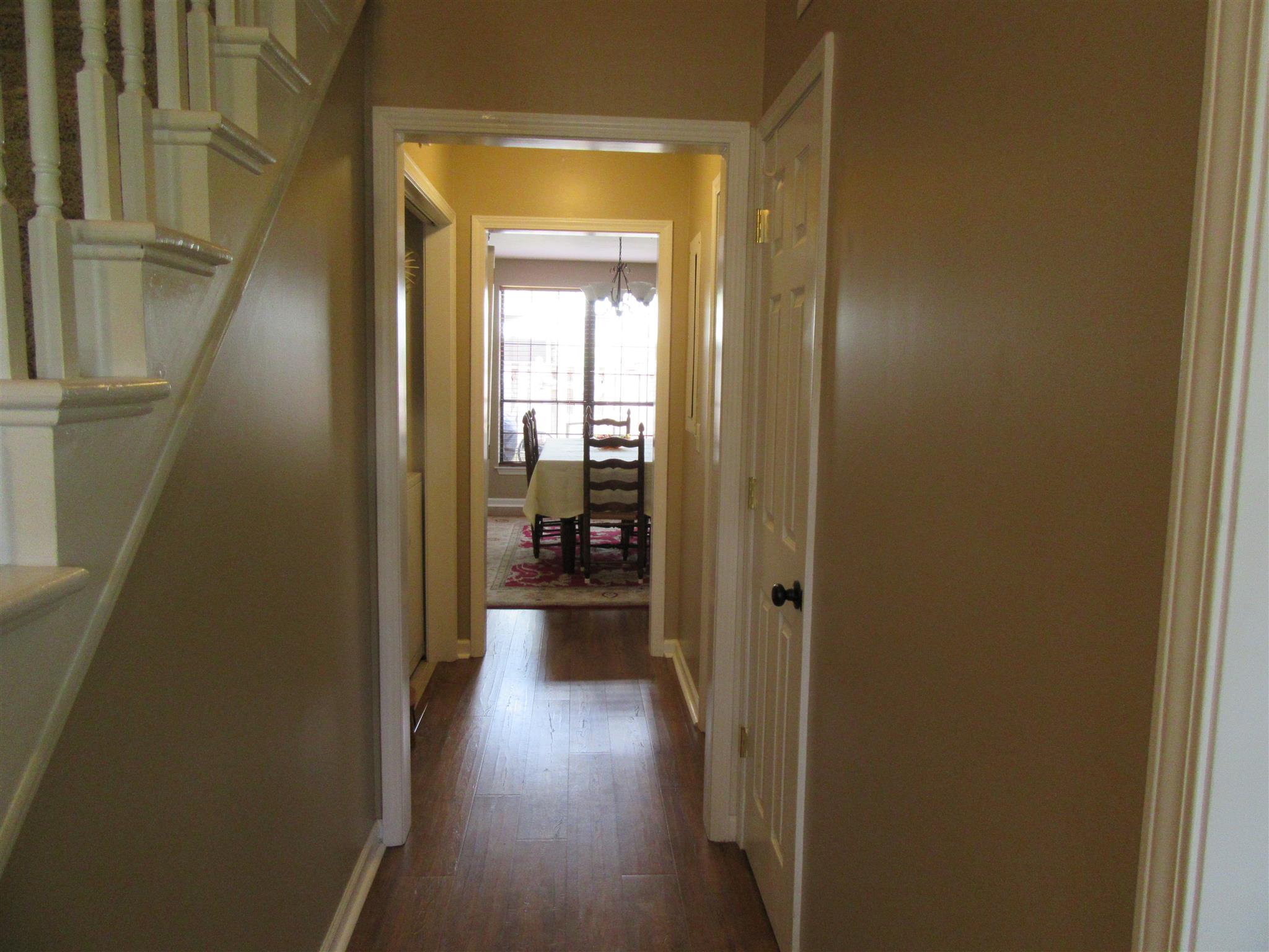1252 General George Patton Road Nashville, TN 37221 - Photo 2 of 30 a view of a hallway with wooden floor and closet