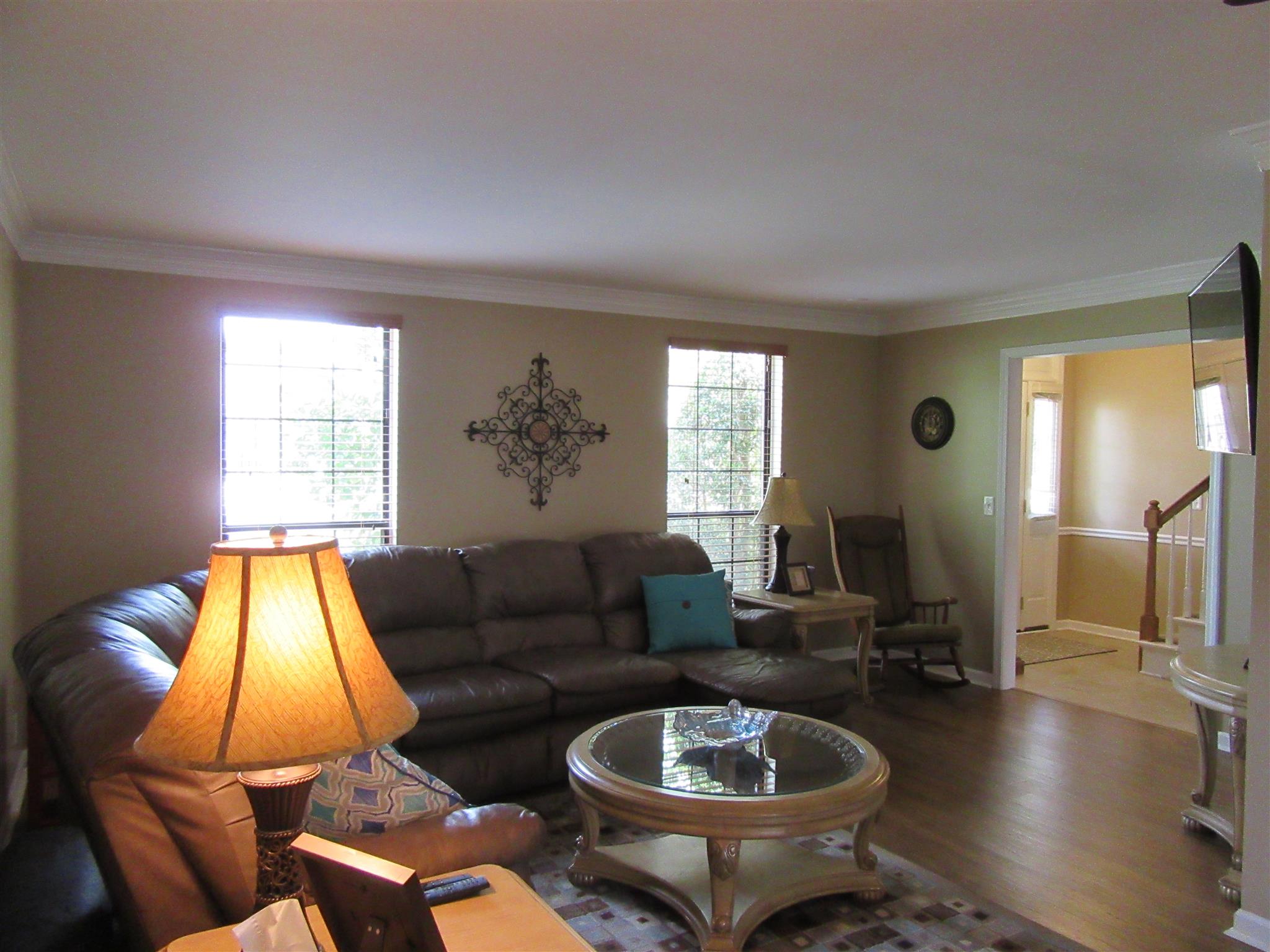 1252 General George Patton Road Nashville, TN 37221 - Photo 12 of 30 a living room with furniture a lamp and a large window