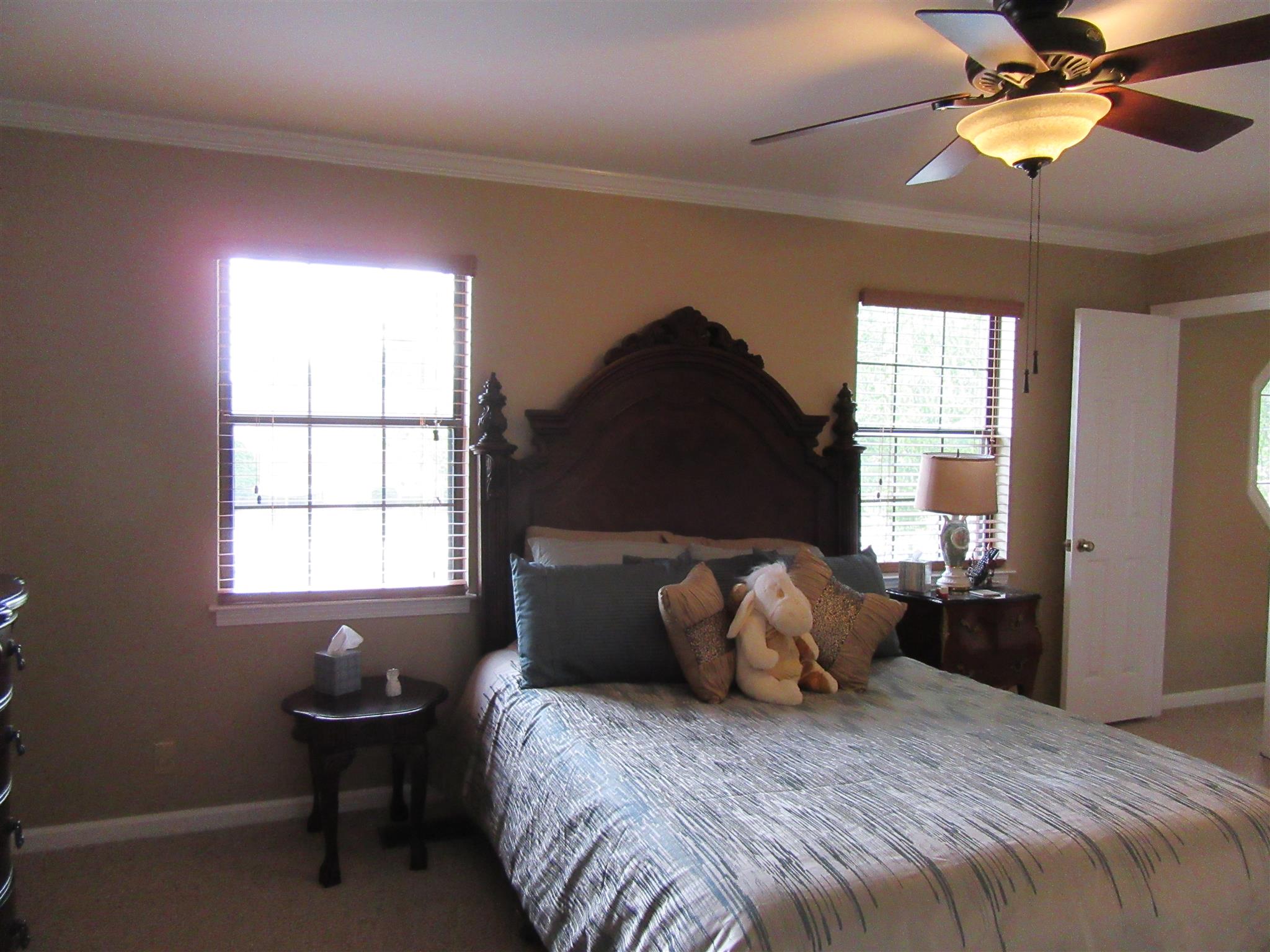 1252 General George Patton Road Nashville, TN 37221 - Photo 18 of 30 a bedroom with a bed and a window