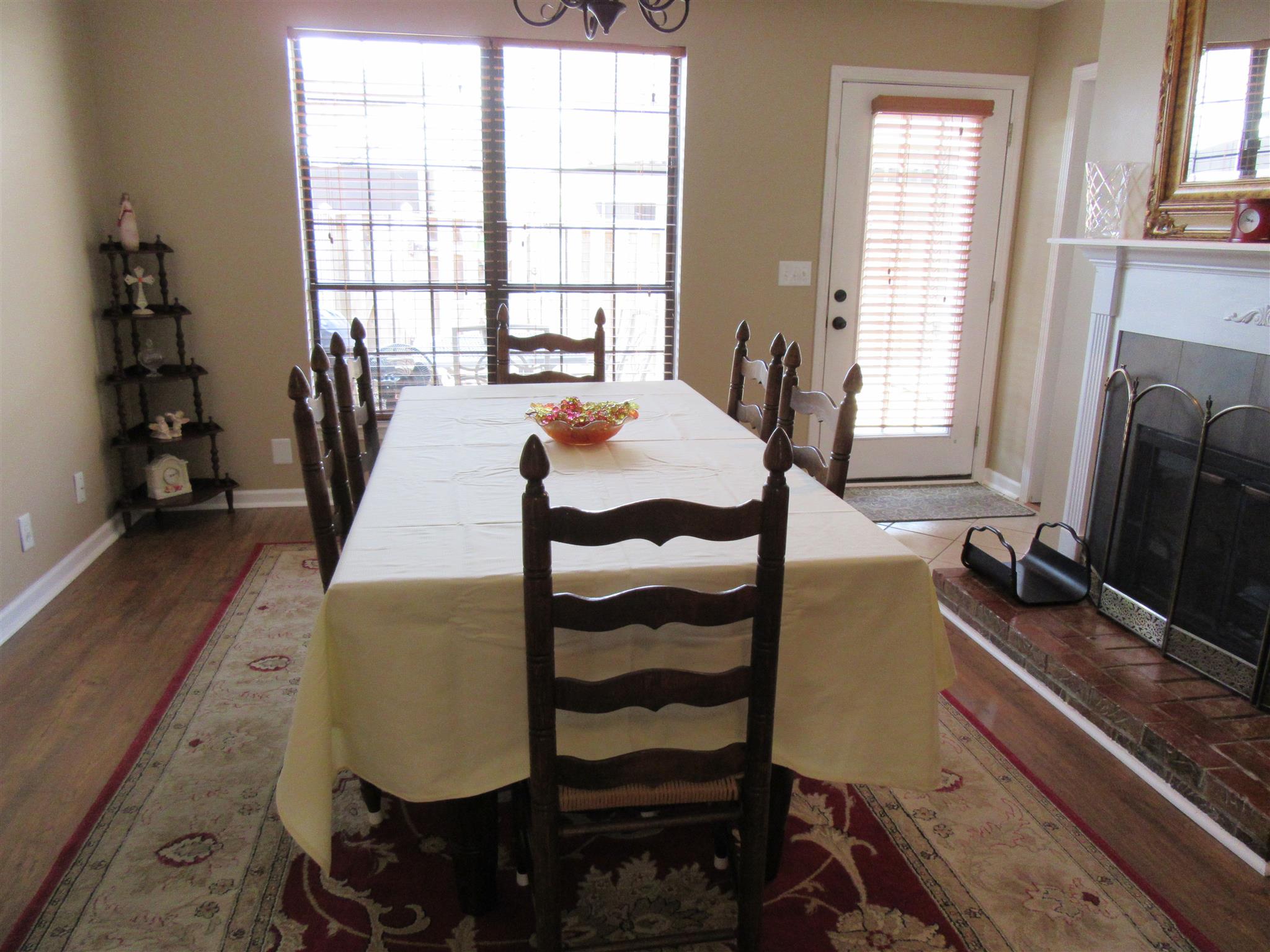 1252 General George Patton Road Nashville, TN 37221 - Photo 4 of 30 a view of a dining room with furniture window and wooden floor