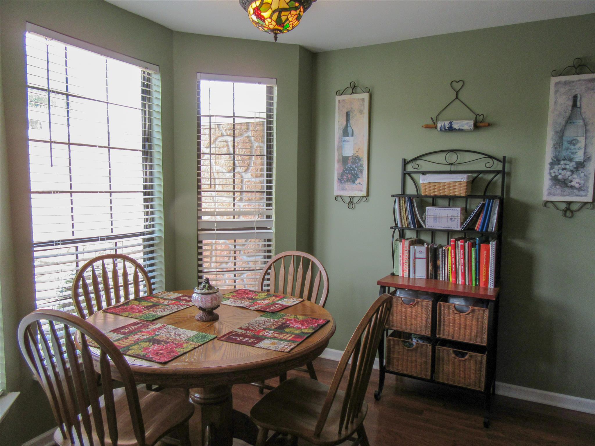 1252 General George Patton Road Nashville, TN 37221 - Photo 9 of 30 a view of a dining room with furniture window and wooden floor