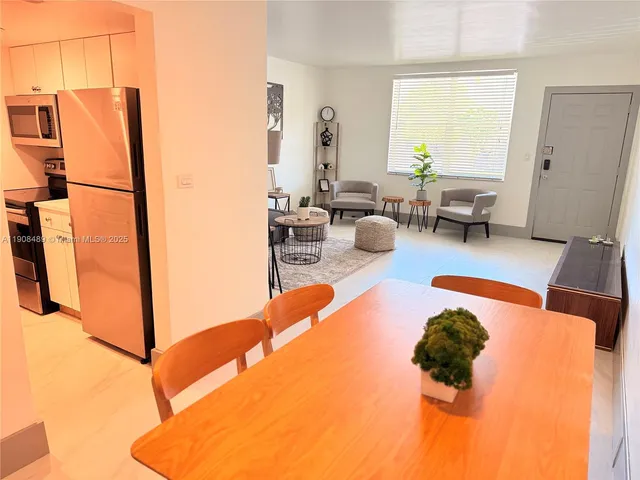 a bed room with a bed and a window