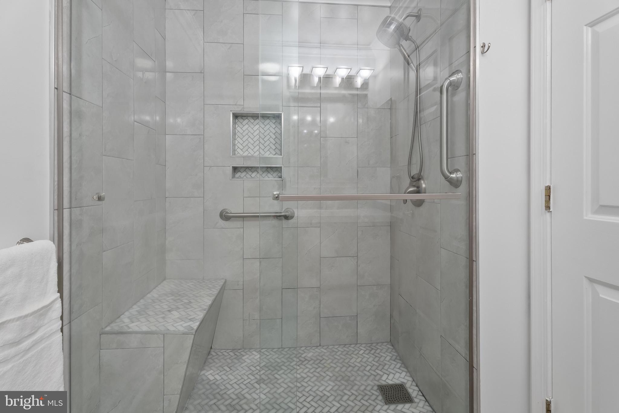 2406 Dominion Drive, Unit 1B Frederick, MD 21702 - Photo 17 of 30 a bathroom with a mirror