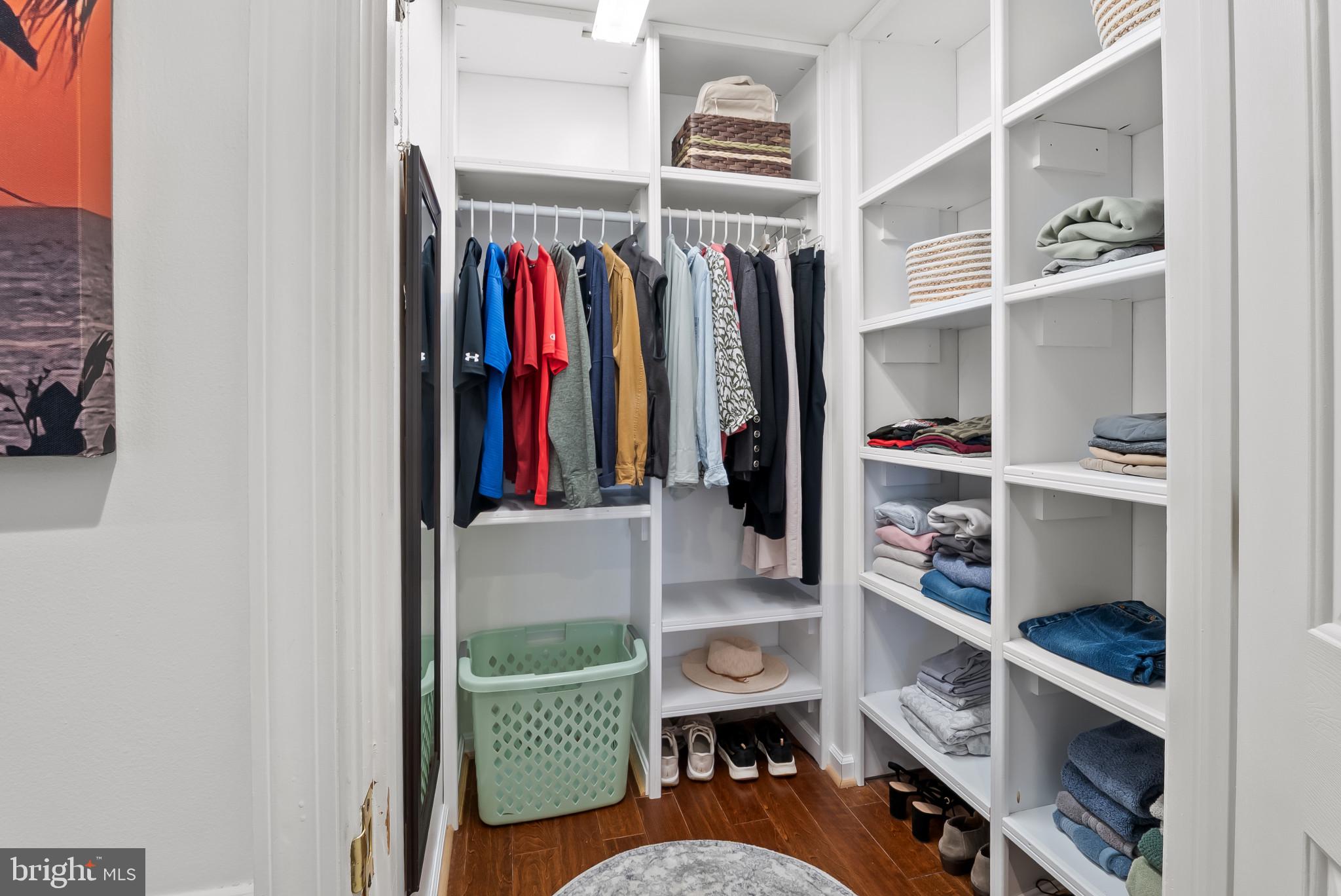 2406 Dominion Drive, Unit 1B Frederick, MD 21702 - Photo 18 of 30 a view of walk in closet with clothes and shoes