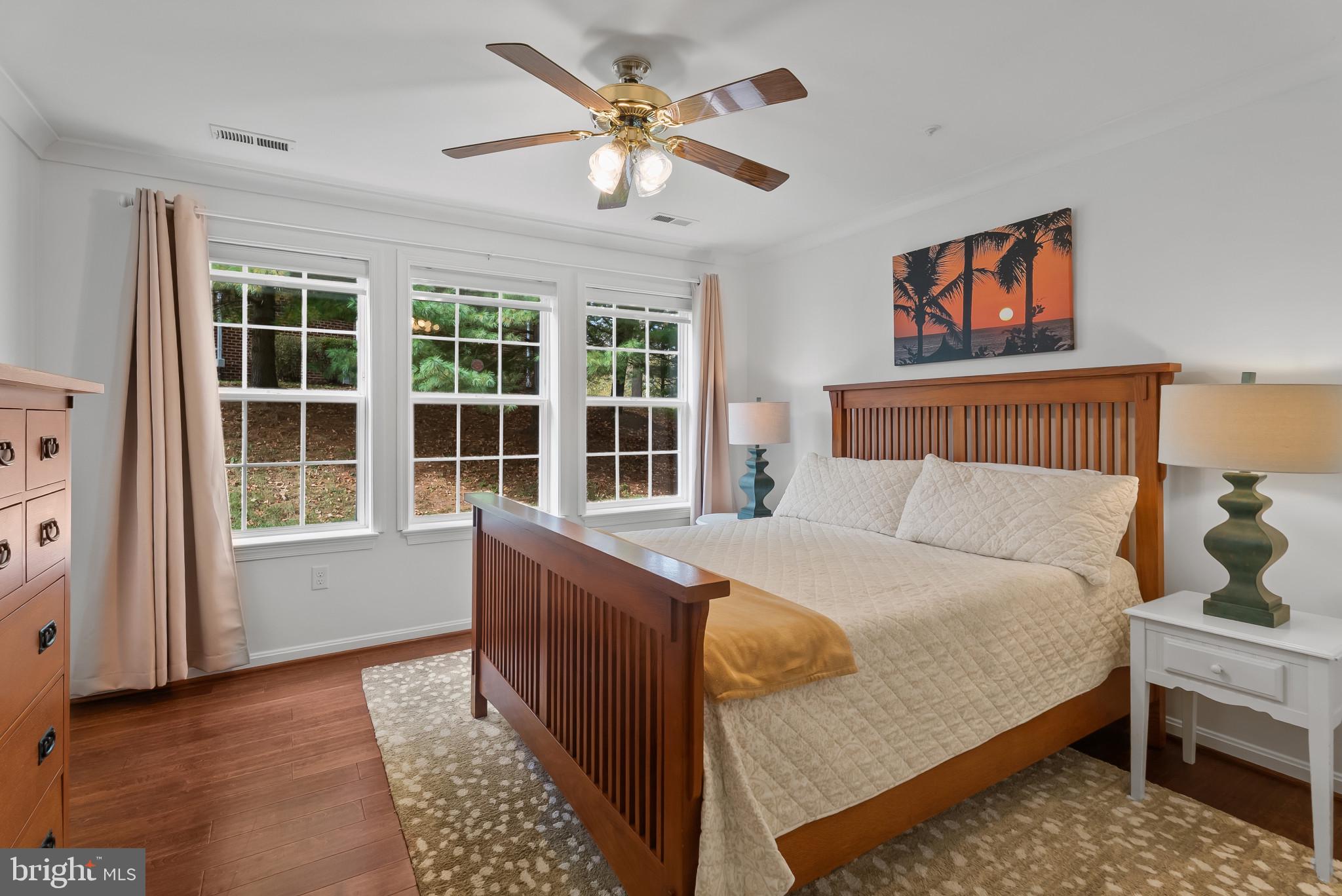 2406 Dominion Drive, Unit 1B Frederick, MD 21702 - Photo 19 of 30 a bedroom with a bed and a large window