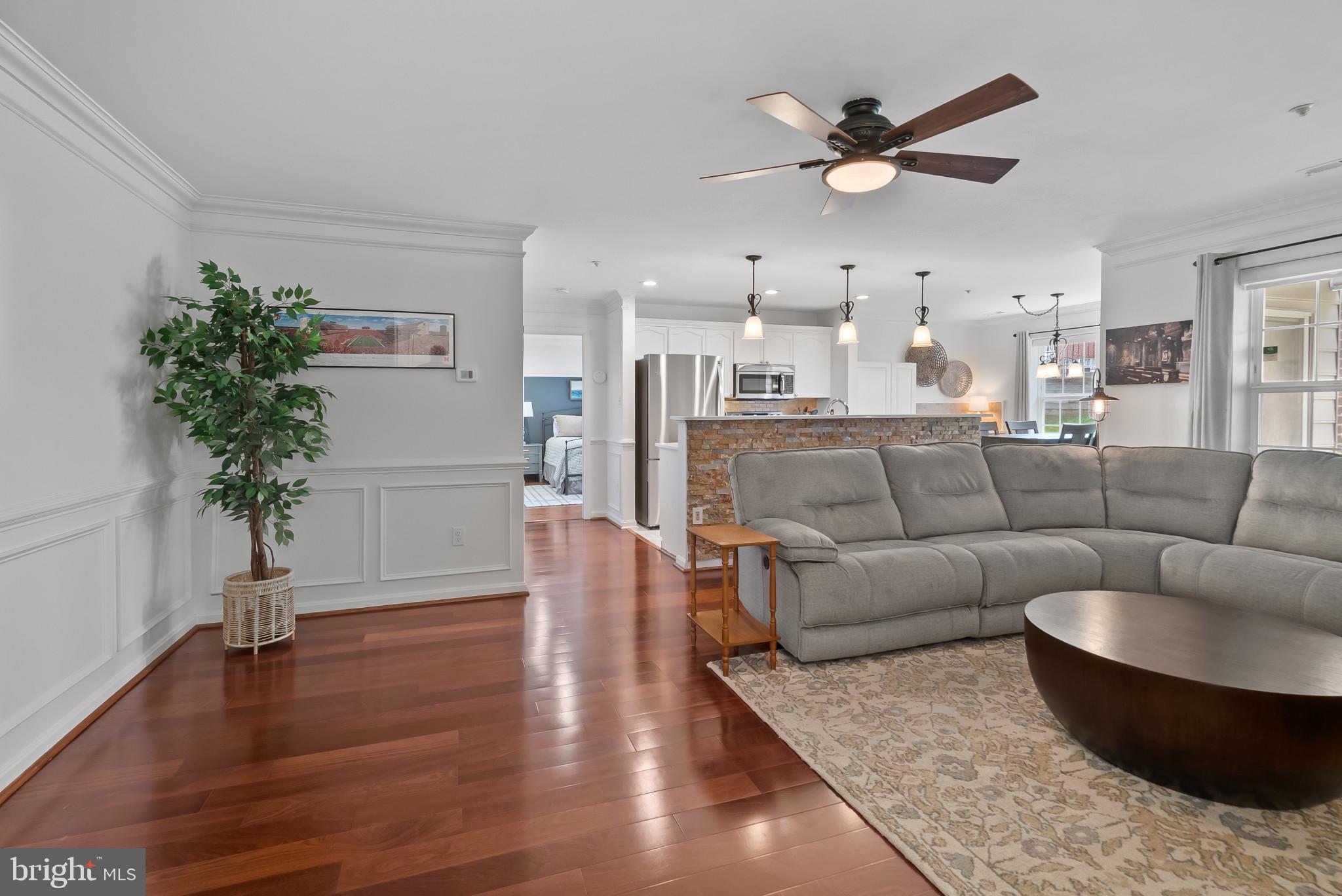 2406 Dominion Drive, Unit 1B Frederick, MD 21702 - Photo 5 of 30 a living room with furniture and a large window
