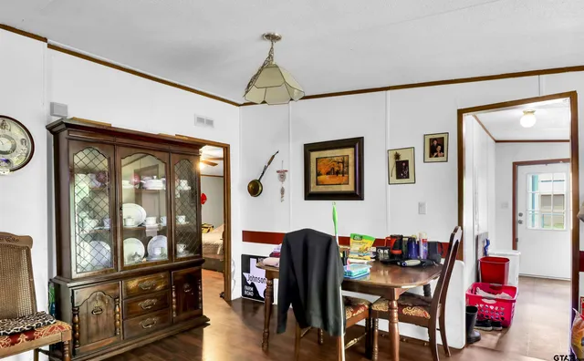 a view of a livingroom with furniture and window