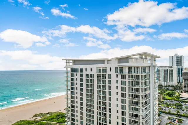 a view of a city with tall buildings in front of it