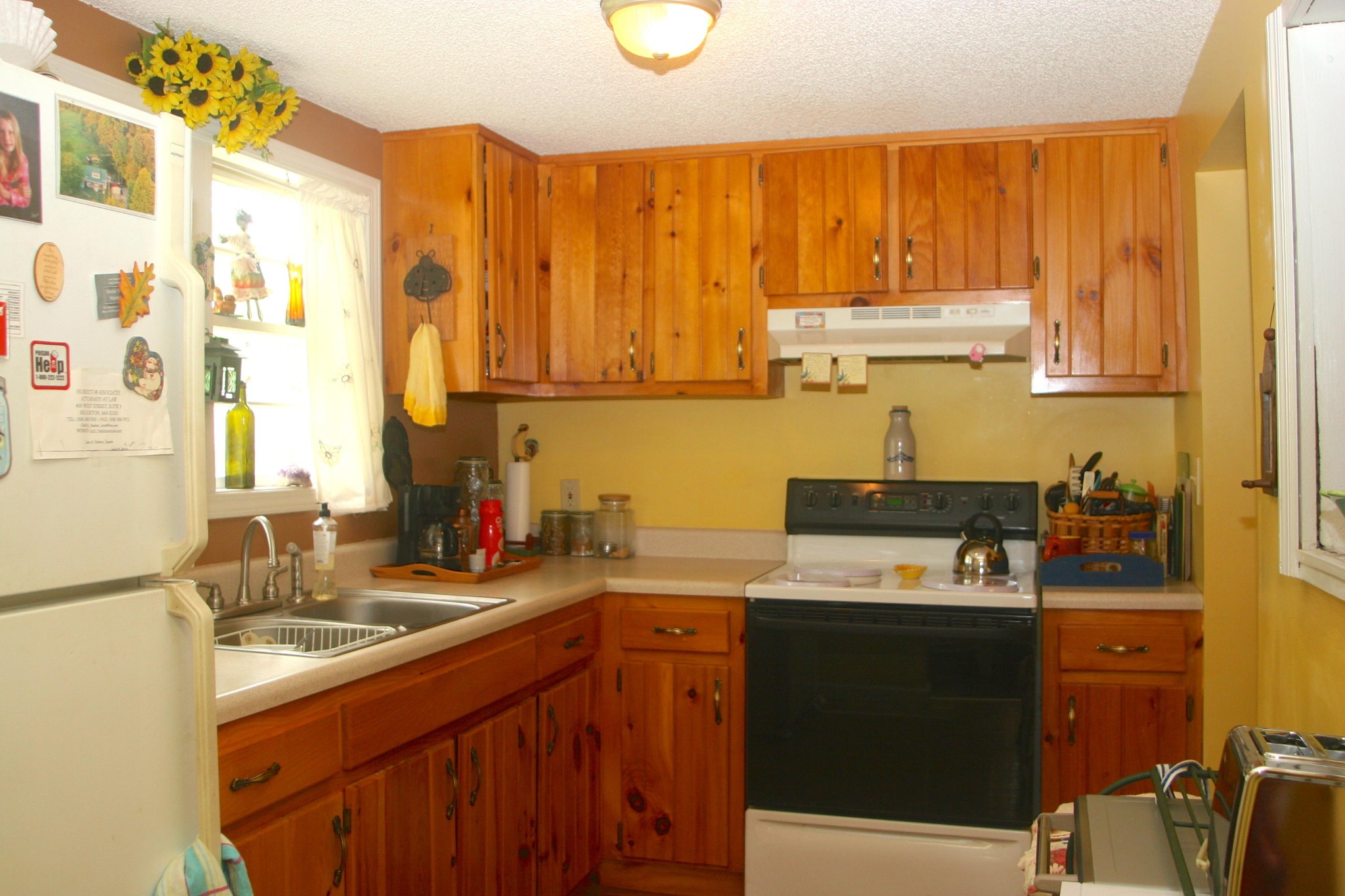 1953 Roslin Road Jamestown, TN 38556 - Photo 12 of 19 a kitchen with a sink a stove and a refrigerator