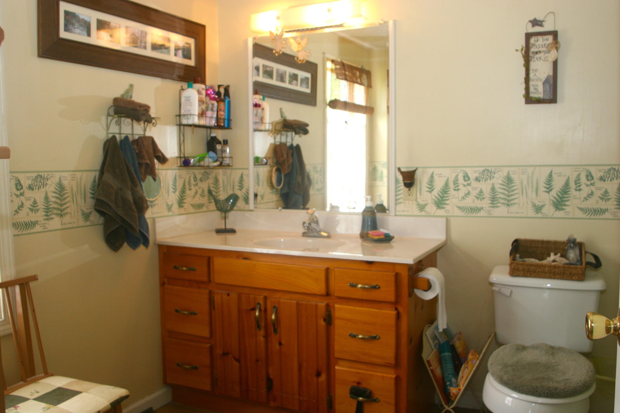 1953 Roslin Road Jamestown, TN 38556 - Photo 19 of 19 a bathroom with a toilet sink and mirror