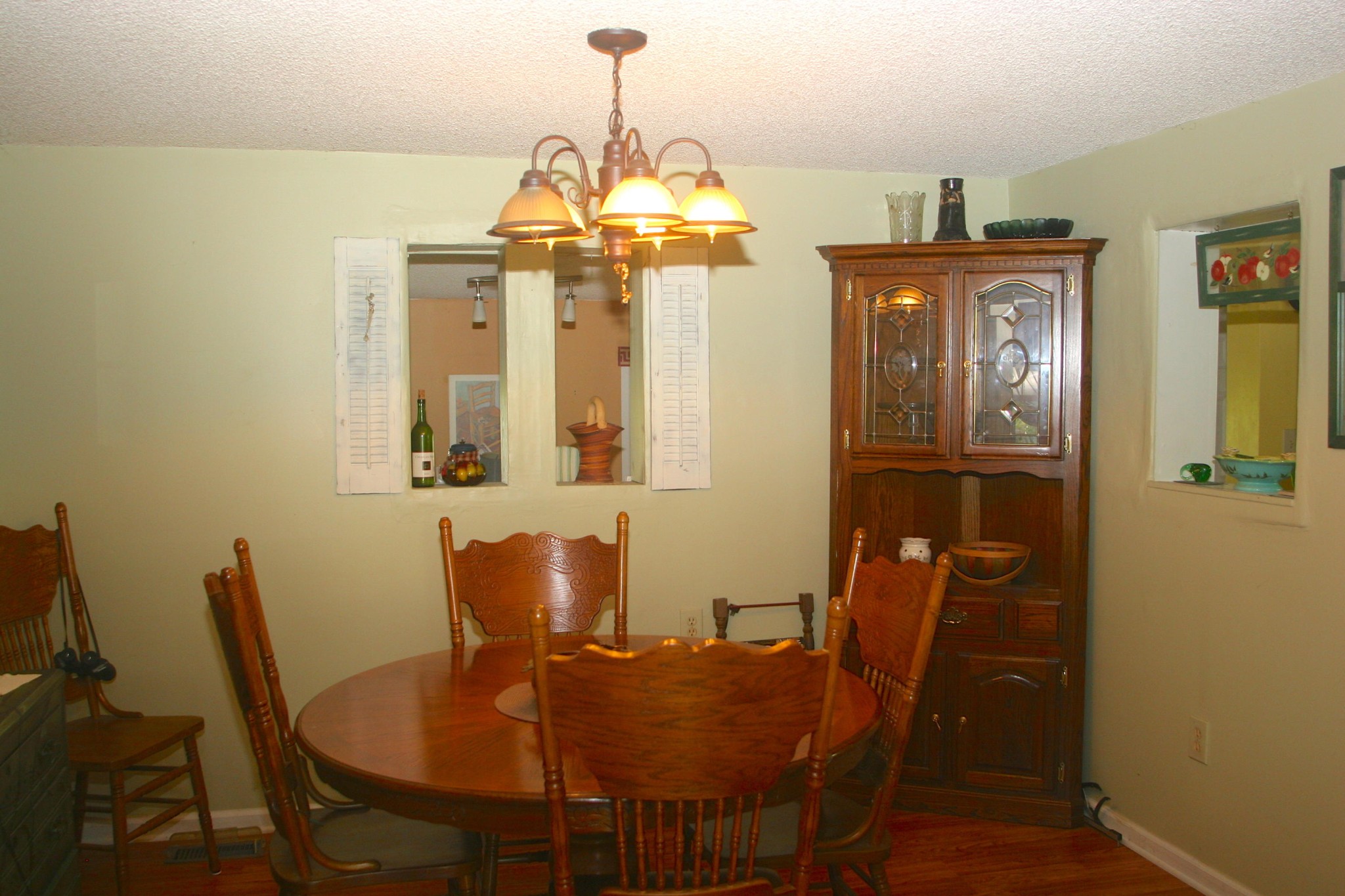 1953 Roslin Road Jamestown, TN 38556 - Photo 10 of 19 a view of a dining room with furniture window and wooden floor