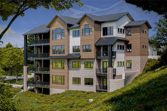 a front view of a house with balcony