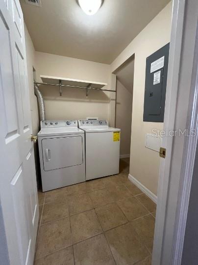 2646 Southwest 87 Way Gainesville, FL 32608 - Photo 17 of 19 a utility room with dryer and washer