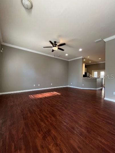 2646 Southwest 87 Way Gainesville, FL 32608 - Photo 2 of 19 wooden floor in an empty room with a window