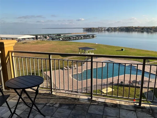a view of balcony with furniture