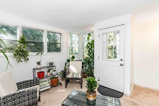 a room with furniture and window