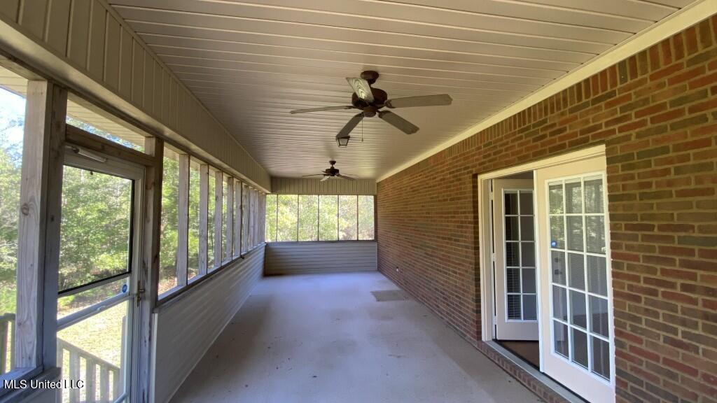 156 Rhodes Circle Brandon, MS 39042 - Photo 10 of 15 SCREENED PORCH BACK