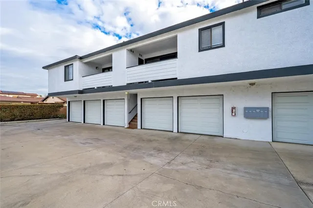 a view of a house with a garage