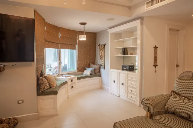 a spacious bathroom with a double vanity sink mirror and double