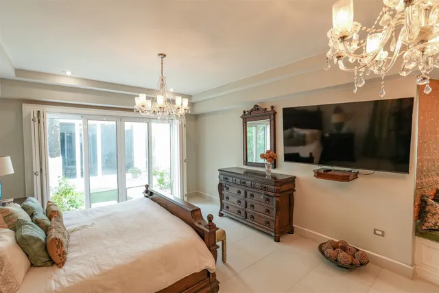 a white bath tub sitting in a bathroom