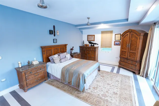 a view of house with outdoor space and swimming pool