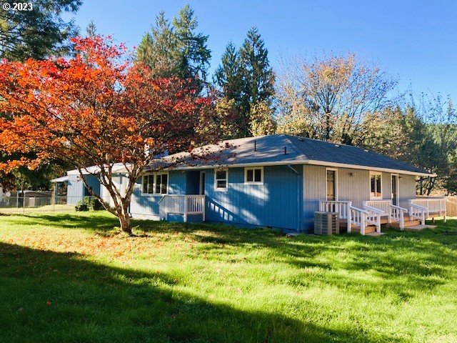 306 South Toutle Road Toutle, WA 98649 - Photo 1 of 36 a view of a house with a big yard