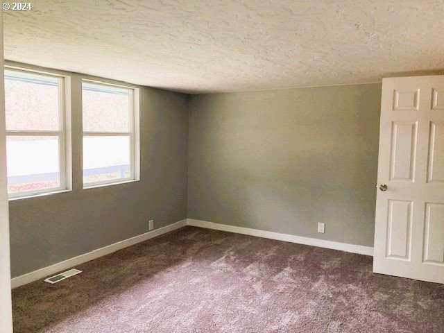 306 South Toutle Road Toutle, WA 98649 - Photo 24 of 36 a view of an empty room with a window