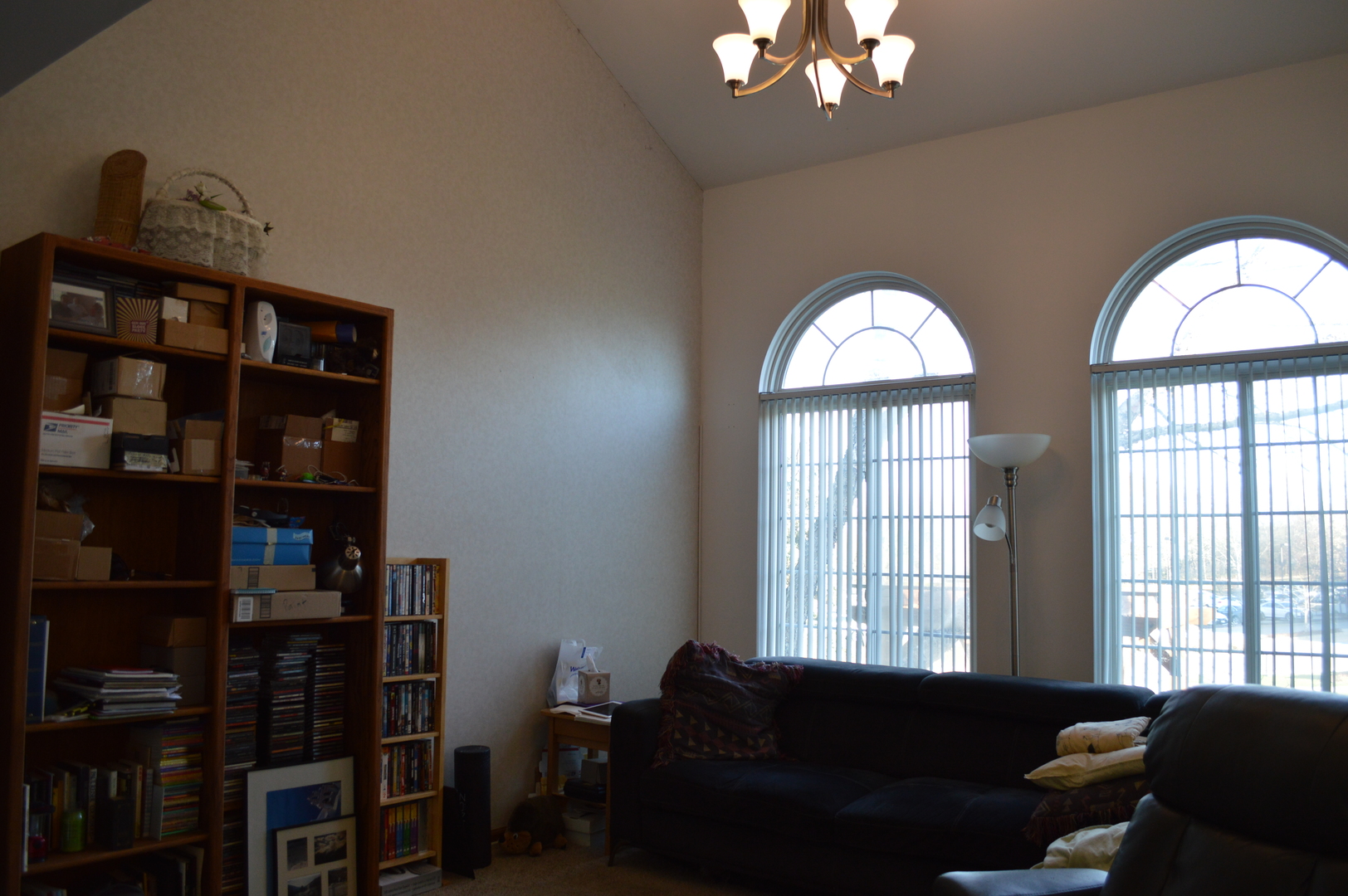 2214 Dawson Lane Algonquin, IL 60102 - Photo 5 of 14 a living room with furniture a bookshelf and a window