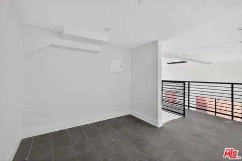 a view of a hallway with staircase