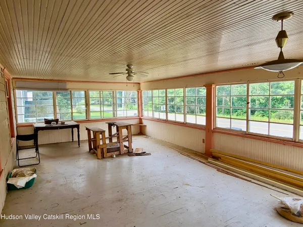 a view of a room with a large window