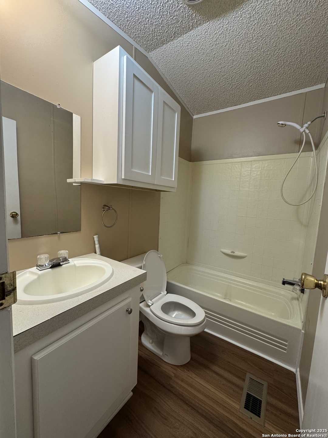 110 Deer Park Road, Unit B La Vernia, TX 78121 - Photo 4 of 12 a bathroom with a sink toilet and shower