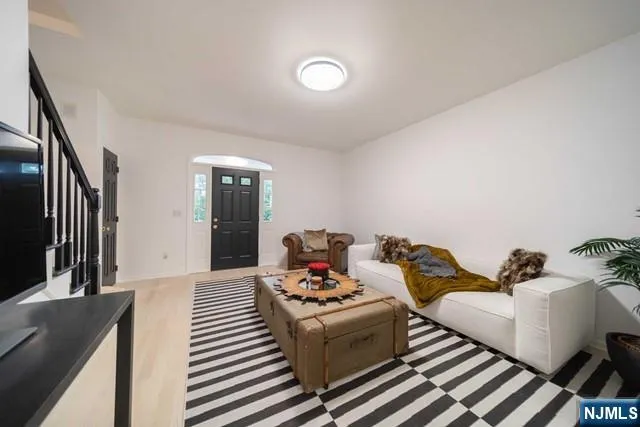 a living room with furniture and a couch