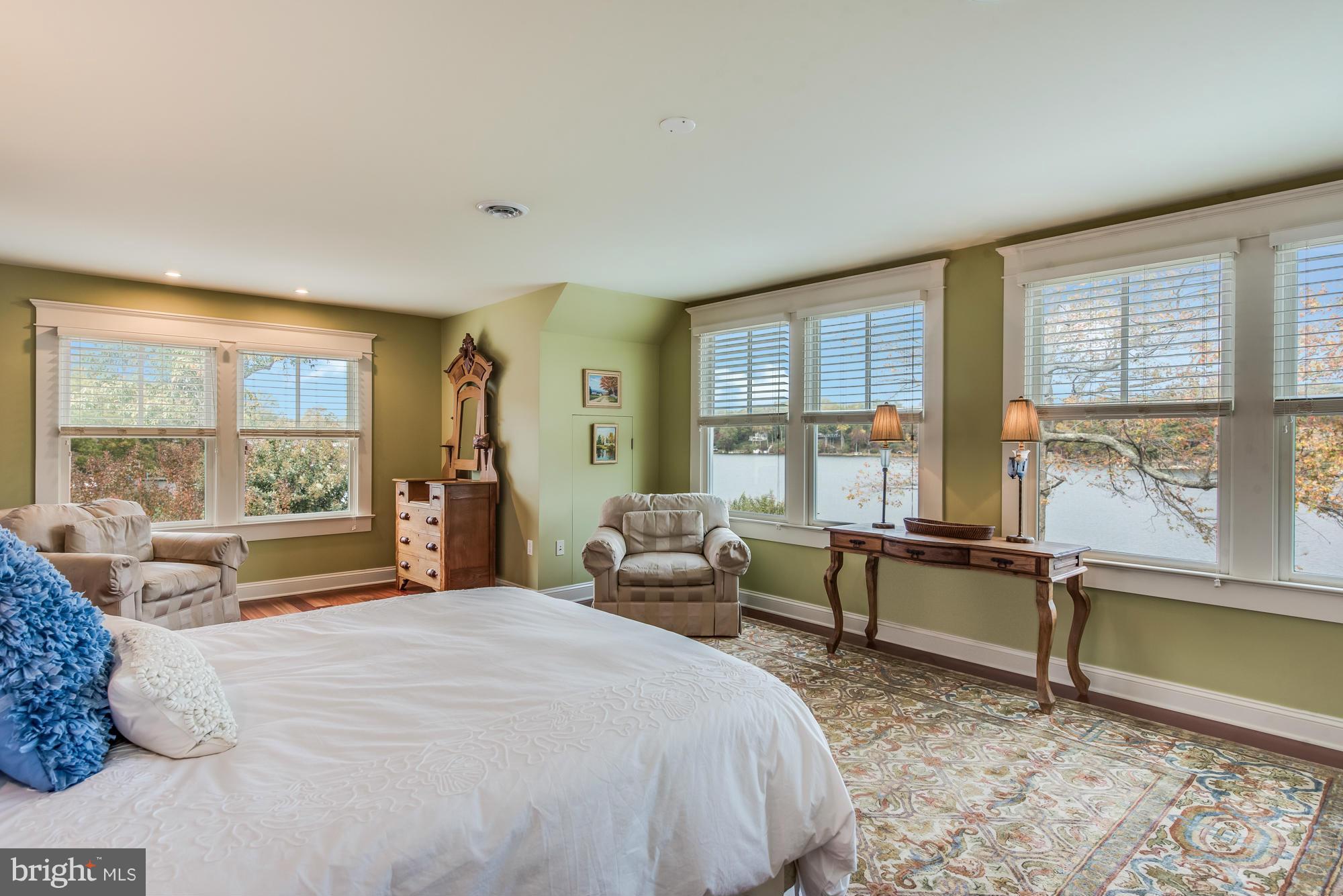 2720 Hambleton Road Riva, MD 21140 - Photo 17 of 22 a spacious bedroom with a bed and large windows