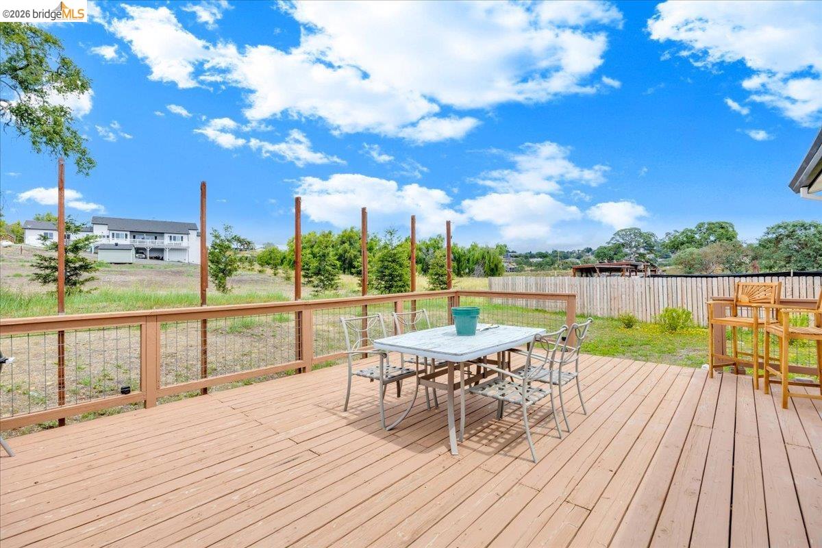 4419 Little John Road Copperopolis, CA 95228 - Photo 25 of 43 Expansive outdoor deck featuring wood-finish flooring and a cable railing system