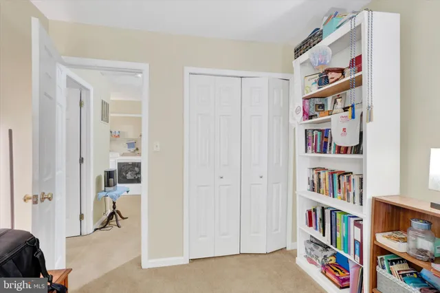 a room with furniture and a window