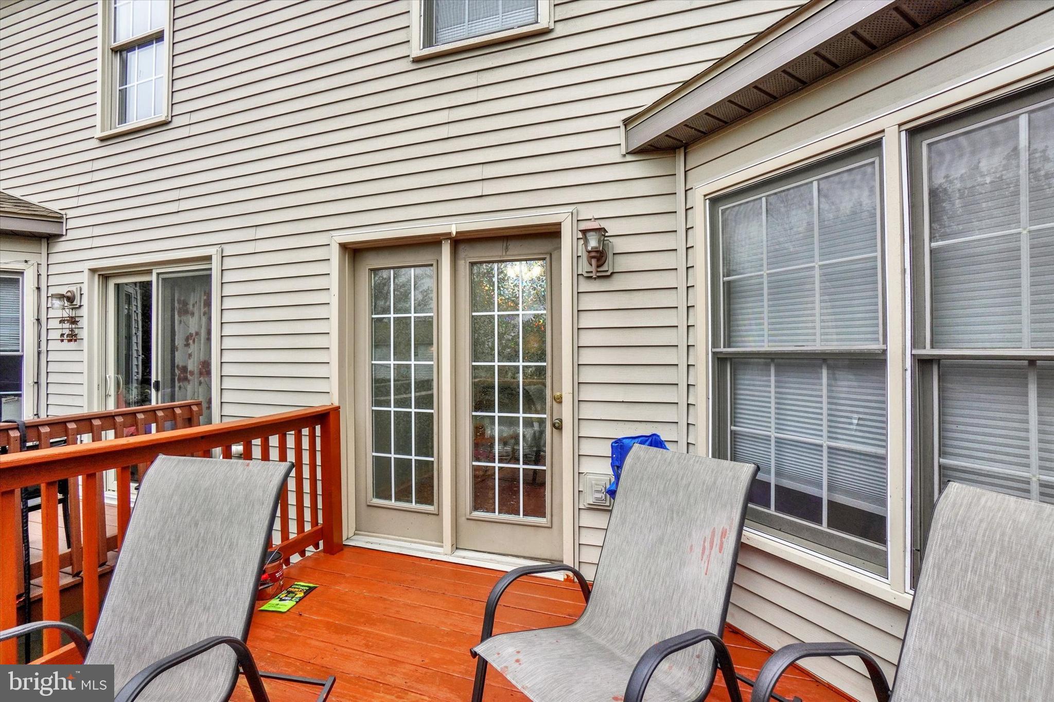 115 Oak Ridge Lane, Unit 115 Dallastown, PA 17313 - Photo 25 of 32 a view of a chair and table in the balcony
