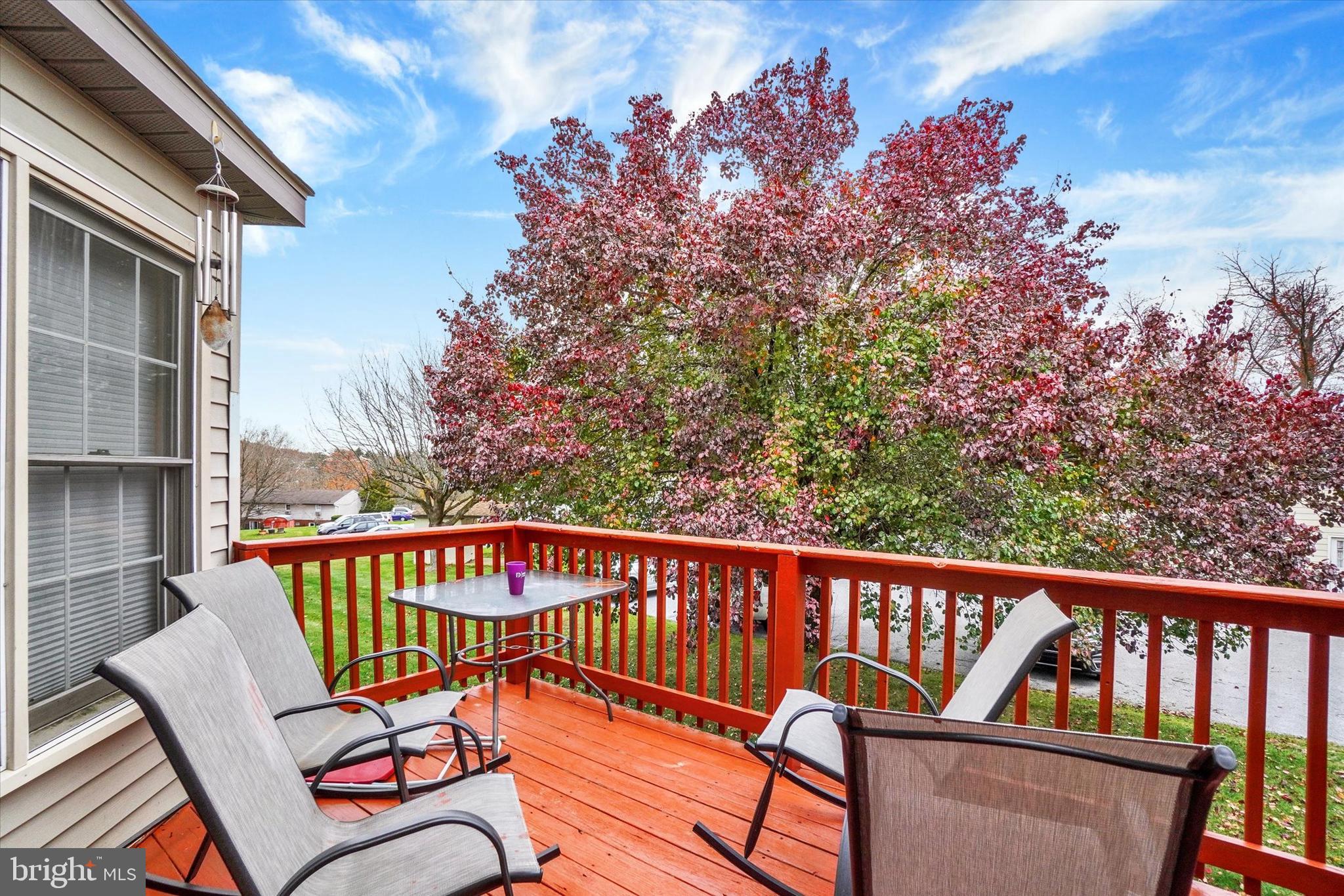 115 Oak Ridge Lane, Unit 115 Dallastown, PA 17313 - Photo 26 of 32 a view of a balcony with wooden floor and fence