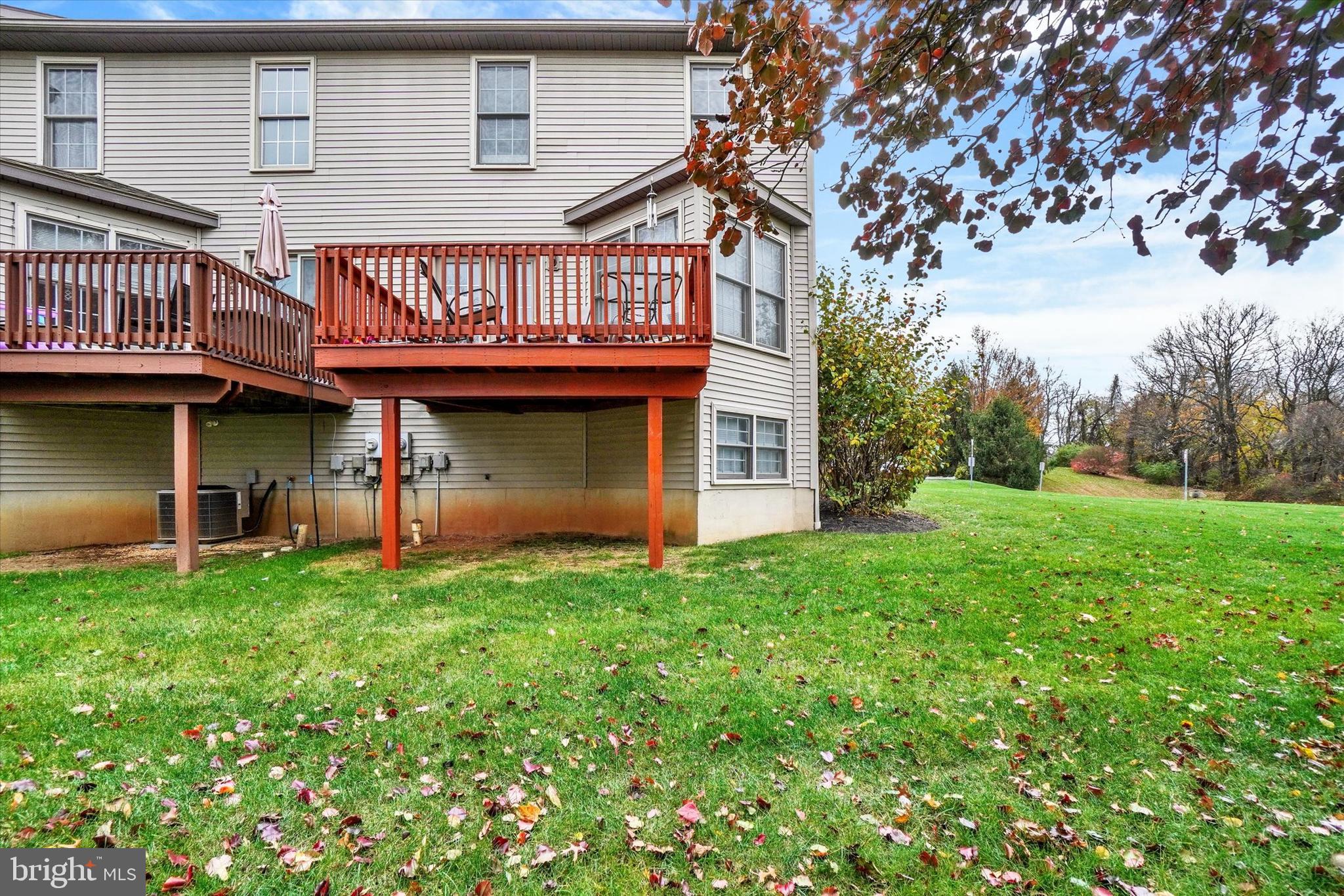 115 Oak Ridge Lane, Unit 115 Dallastown, PA 17313 - Photo 27 of 32 a front view of a house with garden