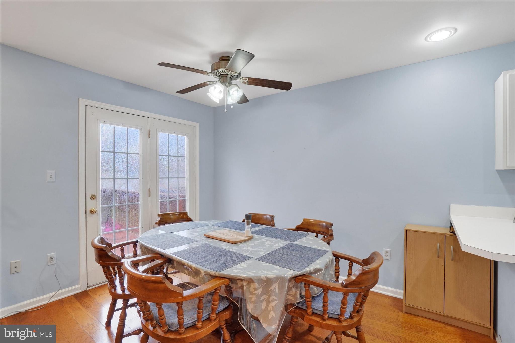 115 Oak Ridge Lane, Unit 115 Dallastown, PA 17313 - Photo 8 of 32 a view of a dining room with furniture window and wooden floor