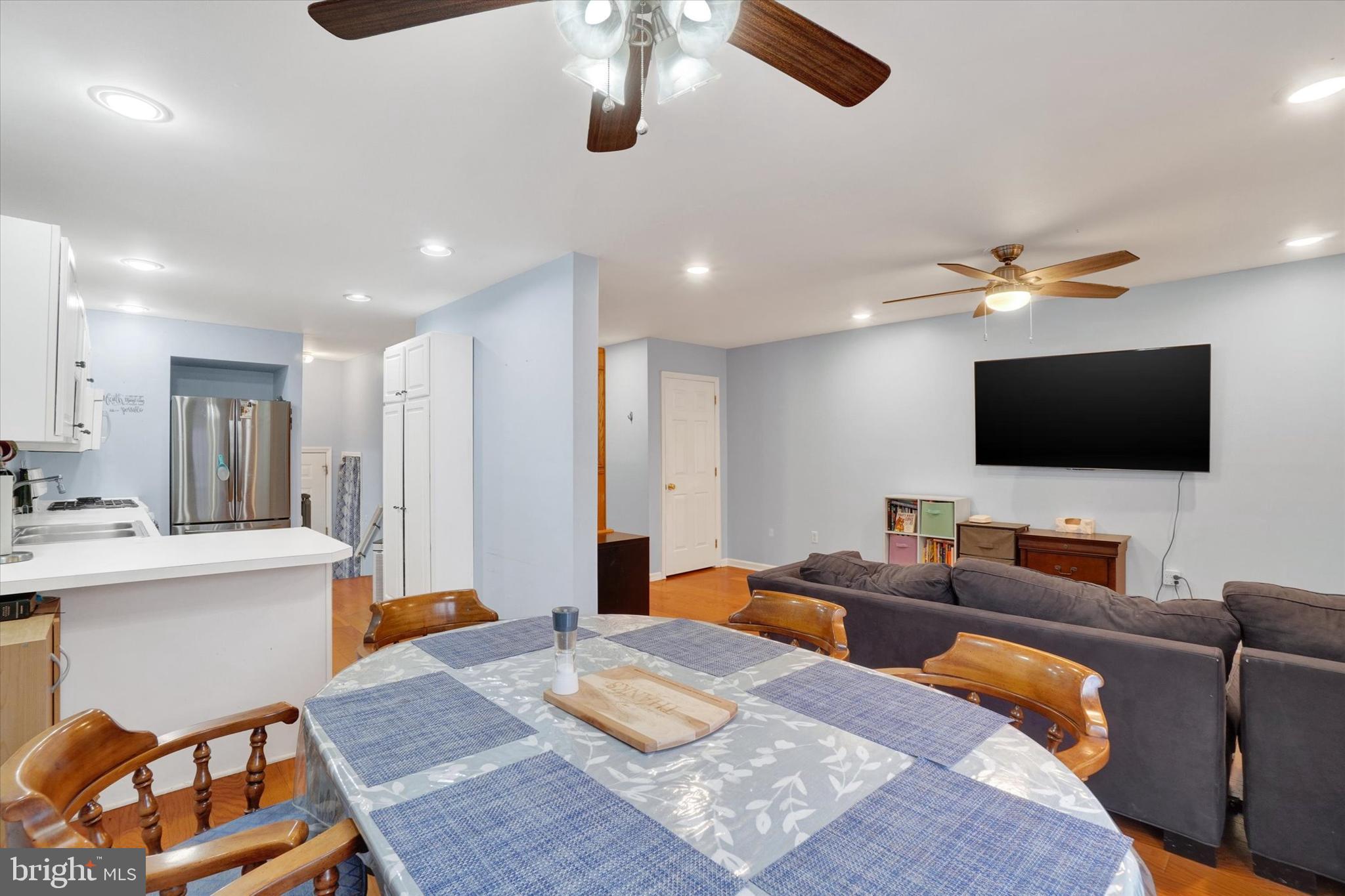 115 Oak Ridge Lane, Unit 115 Dallastown, PA 17313 - Photo 9 of 32 a living room with furniture and a flat screen tv