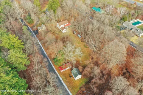 a view of an empty room with a fireplace