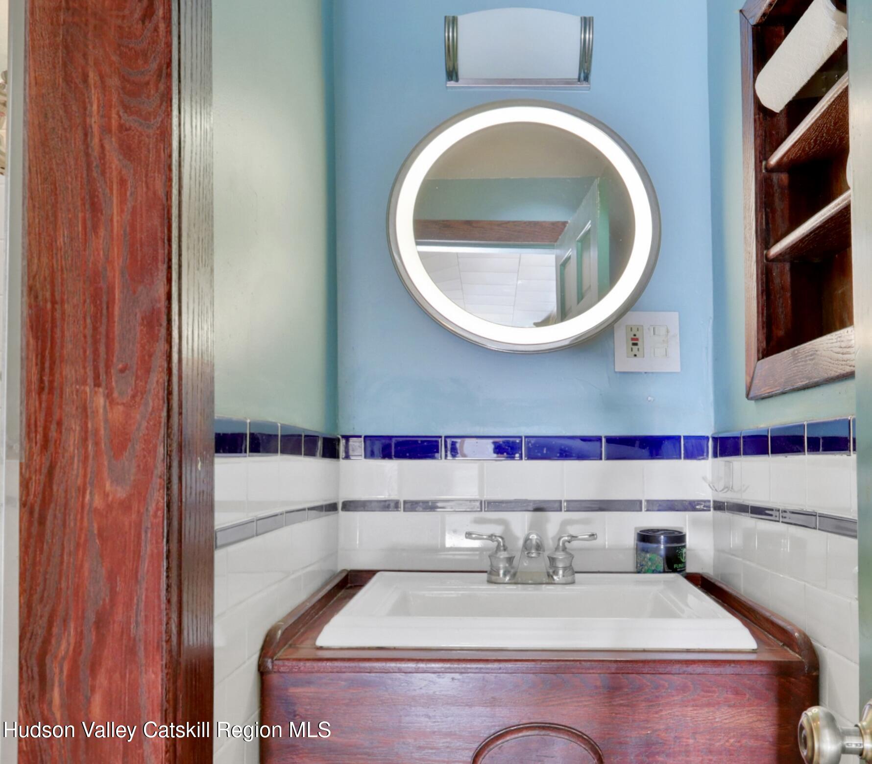 62 Andrew Lane Shandaken, NY 12457 - Photo 5 of 30 a bathroom with a sink and mirror