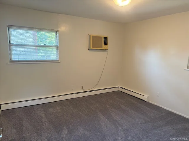 an empty room with a workbench
