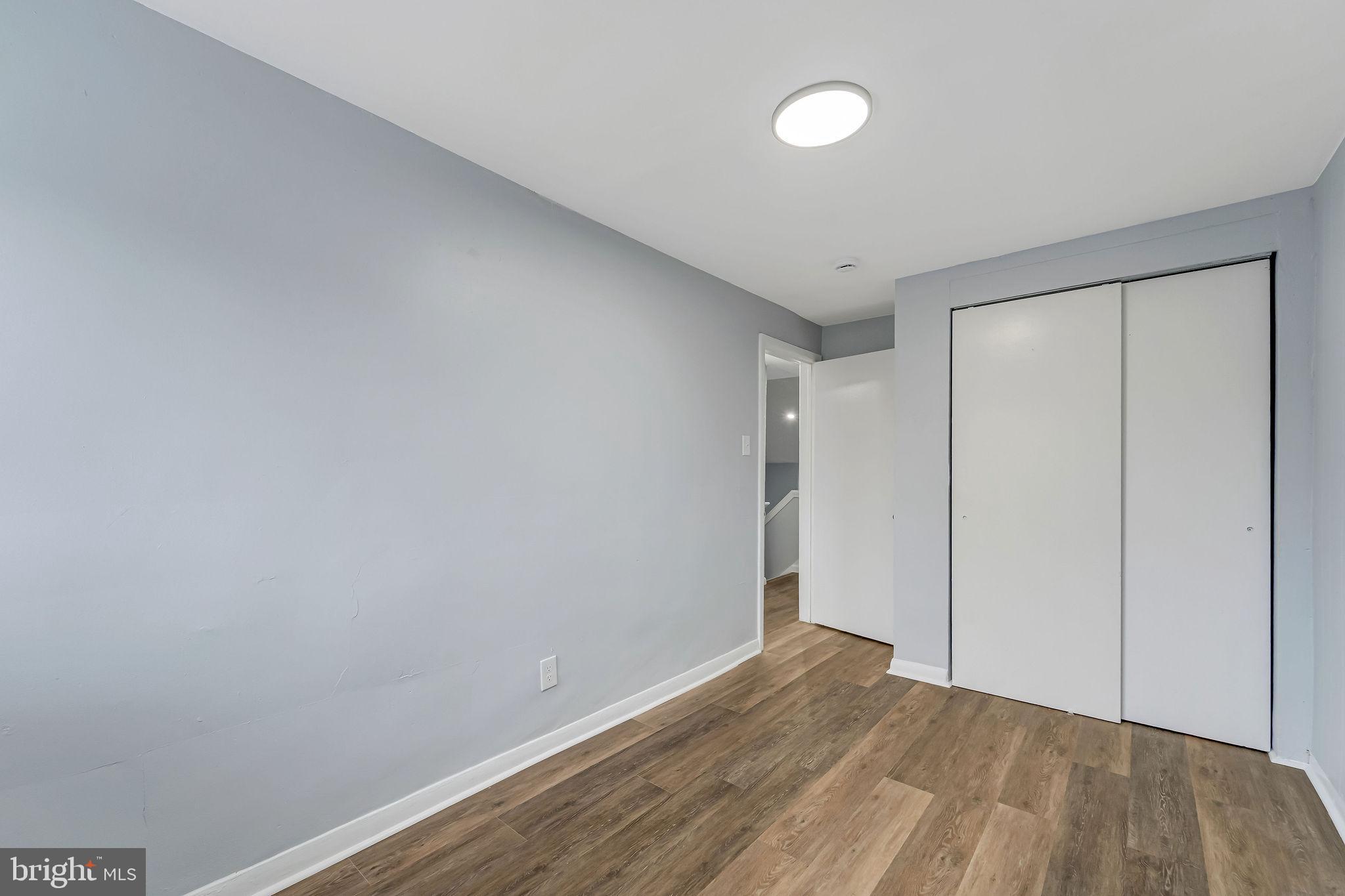 2425 Patton Street Camden, NJ 08104 - Photo 15 of 23 a view of an empty room with wooden floor