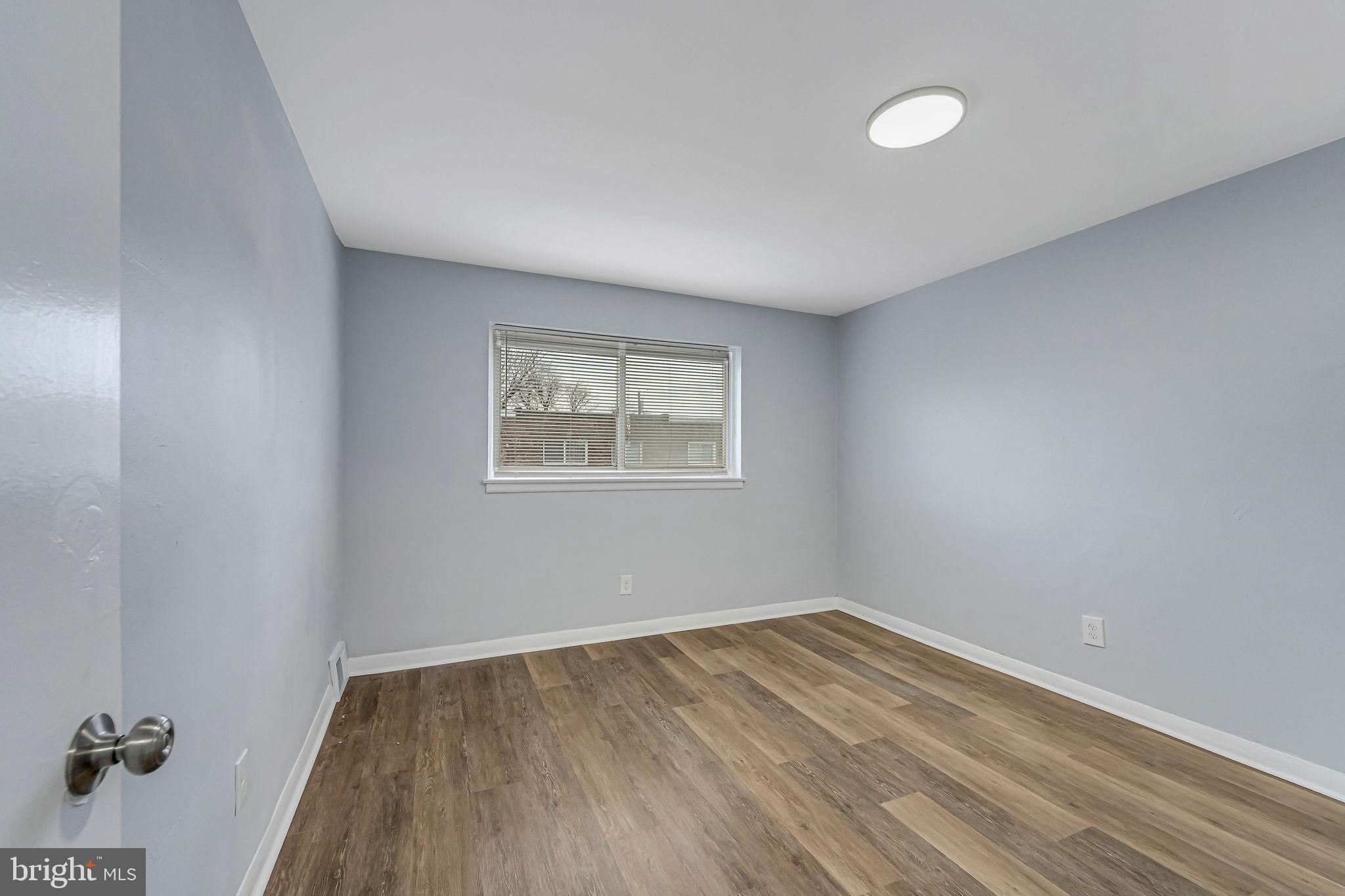2425 Patton Street Camden, NJ 08104 - Photo 17 of 23 wooden floor in an empty room