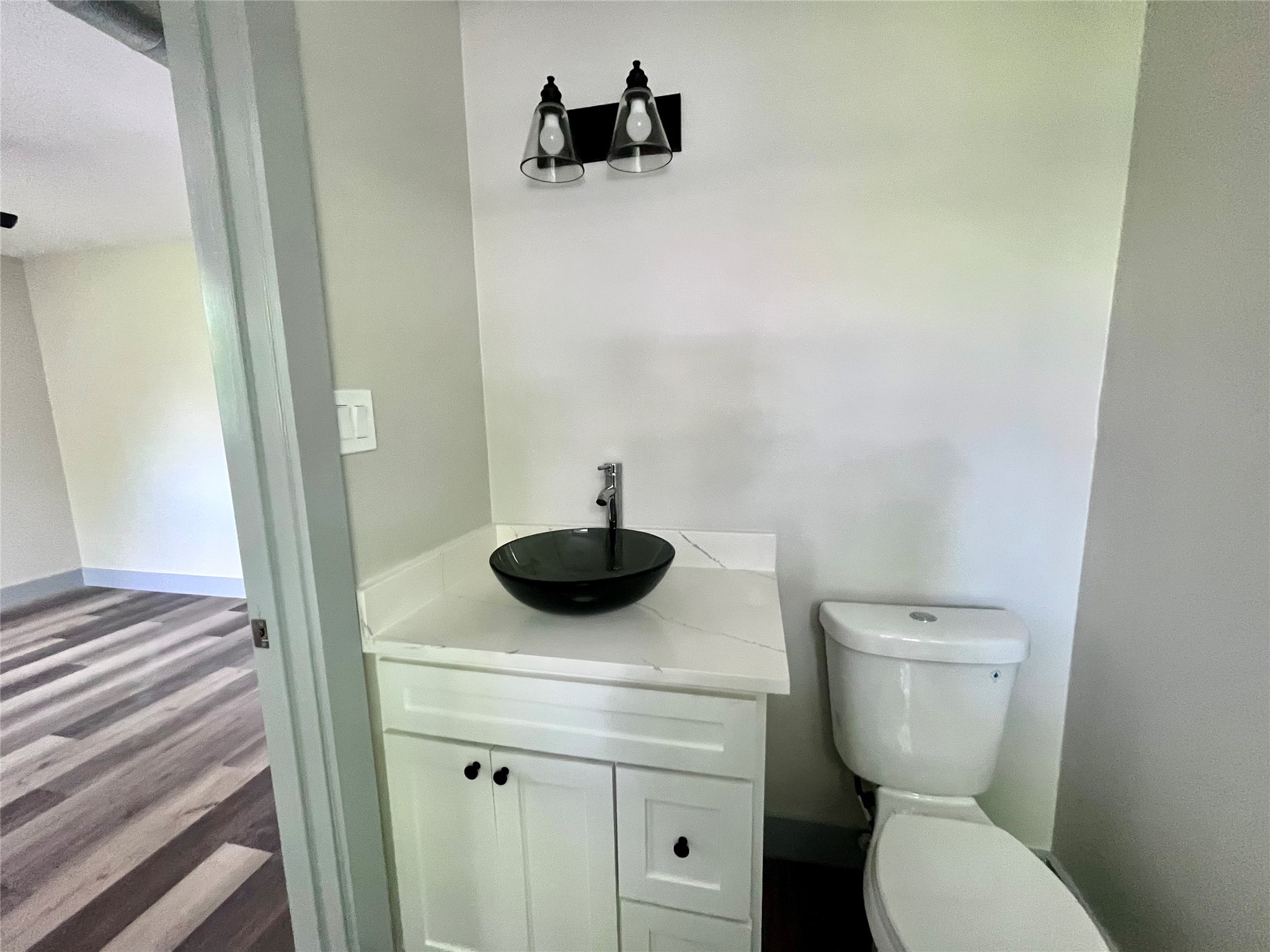 8335 Bonner Drive, Unit 3 Houston, TX 77017 - Photo 6 of 11 a bathroom with a toilet and a sink