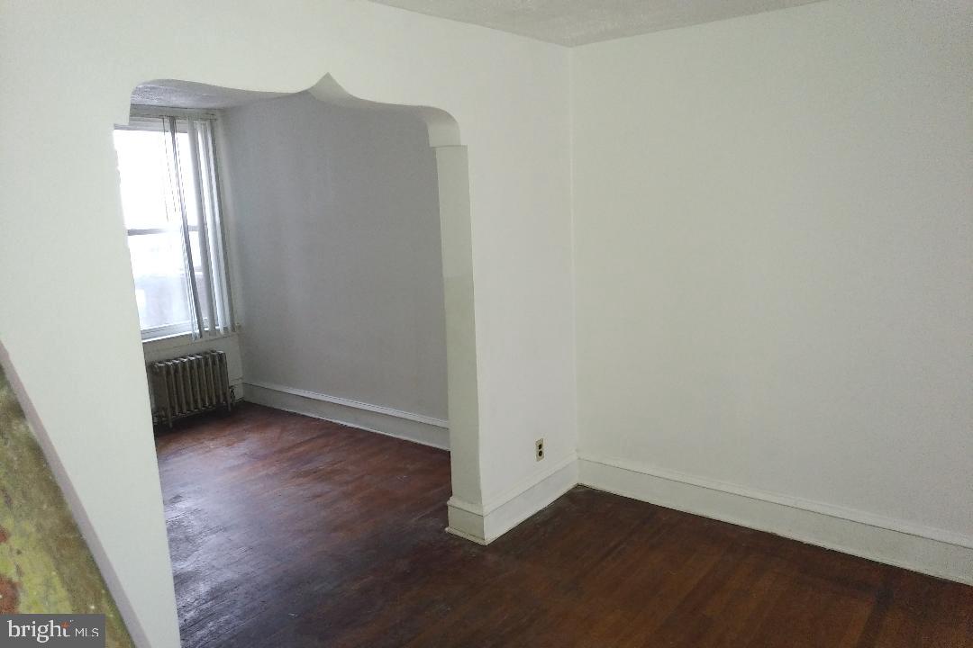 431 Copley Road Upper Darby, PA 19082 - Photo 14 of 27 Charming Arch between Living and Dining Room